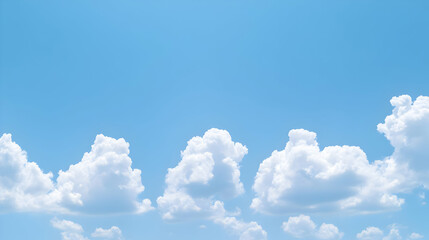 Wall Mural - A Stunning View of Fluffy White Clouds Floating Against a Clear Blue Sky