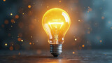 High-quality conceptual stock photo of a glowing light bulb floating above a desk, symbolizing an innovative breakthrough and smart idea