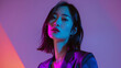 © Ruslan - Asian young fashionable girl Gen-Z in light suit on dark purple pink gradient studio background