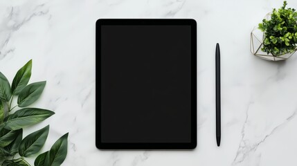 A minimalist black tablet resting horizontally on a smooth white marble surface with a blank screen illuminated by soft natural light alongside a sleek stylus and small geometric plant creating a mode