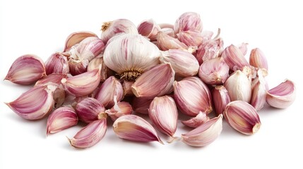 Whole garlic bulbs with scattered peeled cloves, fresh on white background