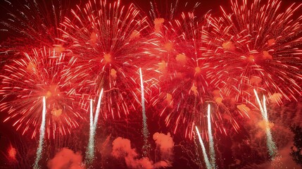 brilliant red fireworks exploding in a dazzling display, perfect for overlaying on night sky backgro