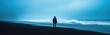 © gen_pick - Lone figure on stormy Pacific beach with massive waves crashing