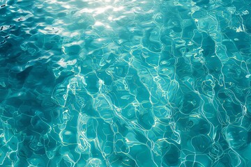 Totally transparent turquoise sea water with sun reflections on a clear water background