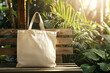 © Jay - Photo of a blank white tote bag mockup on a bench in an eco-friendly garden, Generative AI
