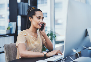 Office, computer and woman in discussion with phone call for web development, progress and update. Creative, business and communication with tech for backend database, research and review of server