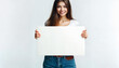 © humanaut - a young woman smiling against an blank background