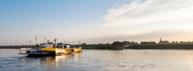 ferry between afferden and boxmeer on river maas in limburg