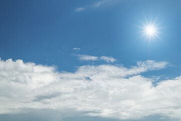 Wall Mural - sun, beautiful blue sky with white clouds. nature background