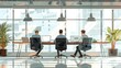 © kanesuan - A team of real estate agents in a modern office, strategizing on property sales and client engagement. Their collaborative effort ensures successful transactions.