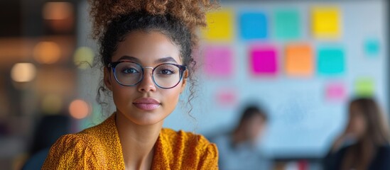 Canvas Print - Portrait of a Confident Young Woman in Glasses