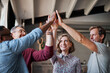 © AK Coop/peopleimages.com - Employees, high five and hands in huddle for plan, teamwork and diversity in company mission. Business people, success and circle for motivation with goals, solidarity and collaboration achievement