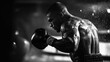 © sirisakboakaew - Male boxer in the middle of a rigorous training routine, focusing on fitness and strength conditioning