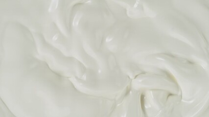 Wall Mural - Super slow motion of whirling milk cream . Filmed on high speed cinema camera at 1000fps