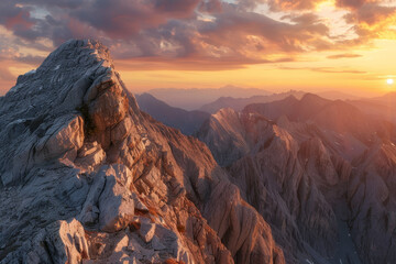 Wall Mural - A mountain range with a beautiful sunset in the background