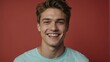 © Alteisen Riese - teenage caucasian man on pastel red background model close-up smiling with beautiful teeth for ad concept space for text