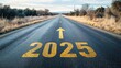 © YONG - A long, empty asphalt road leads into the distance, with the yellow numbers '2025' written on it and an arrow pointing forward