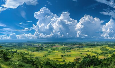 Wall Mural - A panoramic view of a blue sky with fluffy white clouds, creating a calming effect. Free copy space for text.