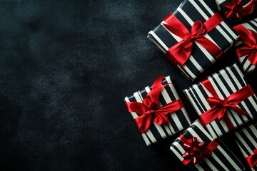 Black and White Striped Gift Boxes with Red Ribbon Bows