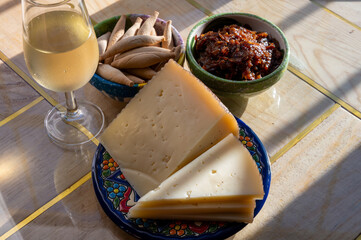 Cheese collection, Spanish matured cheese and onion chutney close up, Andalusian style, Jerez de la Frontera, Spain