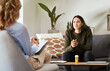 © Flashizzle/peopleimages.com - Depression, psychologist and talking to woman patient on sofa for medical support, anxiety risk or trauma. Counseling, doctor and consultation for mental health and medication prescription for stress