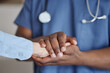 © Flashizzle/peopleimages.com - Healthcare, holding hands or people in hospital for empathy, support or comfort for mental health. Surgeon, person or touch in lobby for trust, helping or counseling in profession for medical crisis