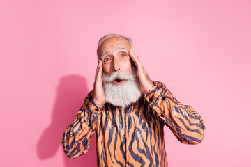 Poster - Photo of astonished impressed pensioner man wear stylish print clothes cool offer isolated on pink color background