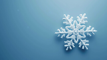 A white snowflake on a blue background.