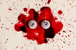 © ADDICTIVE STOCK - Spooky eyeball toys in a fake blood splatter pattern