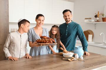 Wall Mural - Happy Jewish family with challah bread in kitchen