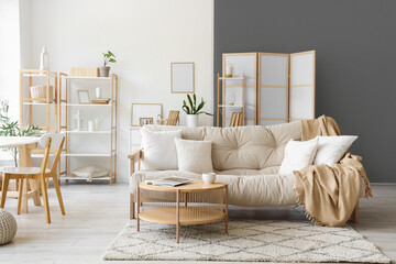 Poster - Interior of modern light living room with sofa and table