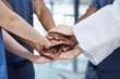 © peopleimages.com - Medical team, hands and people huddle for support, collaboration or healthcare goal. Doctor, nurses or stack together in clinic for community, group solidarity and motivation for cooperation closeup