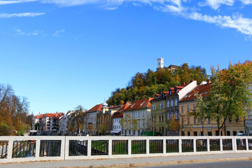 Wall Mural - Picturesque historical buildings in central Ljubljana, capital of Slovenia. Autumnal foliage on the trees.