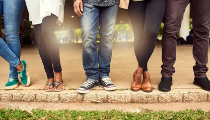 Legs, outdoor and people in row for team building, waiting and together in town, city or park. Group, feet and queue as colleagues, candidates and collaboration as community in company for about us