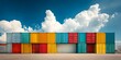 © PegawaiNegriStock - stack of colorful shipping containers arranged in an artistic, set against the backdrop of sunny day