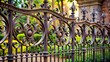 © nittiya - Decorative wrought-iron fence with intricate scrollwork and ornate gate , ornamental, metal, design, outdoor, elegant