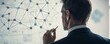 © Ahmad - Network diagram being drawn by a businessman to explain strategies.