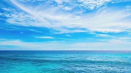 a beautiful scene of the blue ocean against the blue sky background. the ocean stretches out as far 