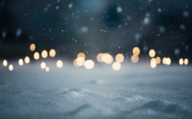 Wall Mural - Snowy surface with snowflakes gently falling, warm glowing lights, dark winter background.