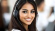 © Jue T.Look - Indian Female Customer Service Operator Wearing Headset.