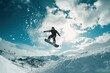 © Boinah - A snowboarder performs a jump against a backdrop of snowy mountains and a bright sky.