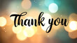© Erlinda - Thank you lettering on blurred lights bokeh background