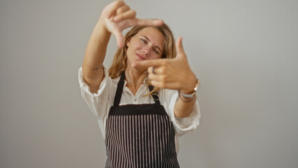 Poster - Young woman making camera gesture with hands over isolated white background