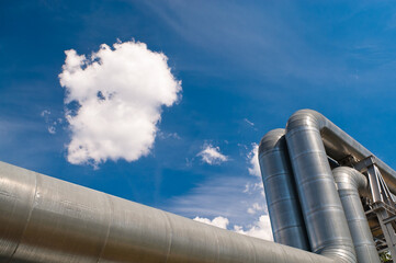 pipeline, blue sky and clouds in the background