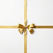 © Dmitriy K. - Gold ribbon tied in a bow on a white background
