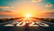 © Abdul - road with written 2025 and arrow pointing towards the horizon to represent the future and positivity and success of the new year