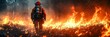 © keks20034 - A firefighter fighting a natural disaster. The concept of fighting a forest fire