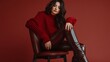 © The Little Hut - Fashionable confident woman wearing burgundy color knitted sweater faux leather pants pointed toe boots posing on brown background Fulllength studio fashion portrait : Generative AI