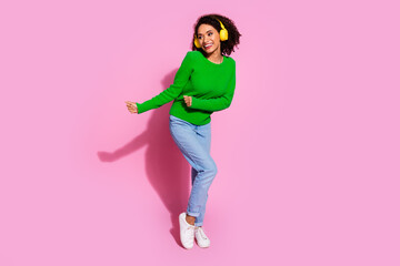 Wall Mural - Full size photo of pretty young girl earphones dancing wear trendy green outfit isolated on pink color background