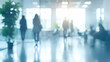 © HQAsset - Blurred Abstract Background of People Walking in a Modern Office Building with a Plant in a Pot